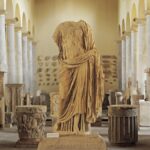 Why are numerous Roman statues headless?