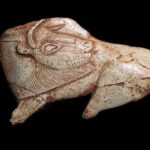 Bison Licking Insect Bite: A 14,000-year-old realistic figure sculpted from a weapon