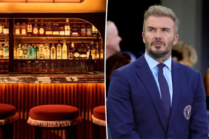 Partier attempts to get sly shot past David Beckham at Mulberry Bar