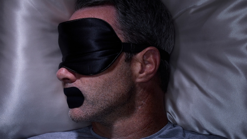 Some individuals declare taping your mouth shut assists you sleep much better– however what are the threats?