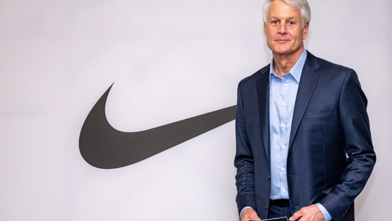 Nike changes its CEO with a long time veteran and the stock is leaping