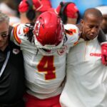 Chiefs WR Rashee Rice hauled off field after hit to knee