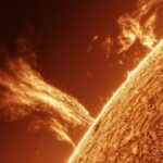 View a 100,000-mile-high tower of plasma appear from the sun in this sensational video