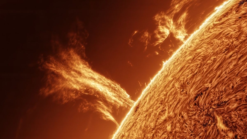 View a 100,000-mile-high tower of plasma appear from the sun in this sensational video