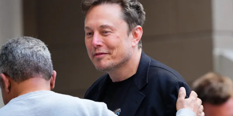 Elon Musk blasts U.K. federal government after being snubbed from leading financial investment top over race riot posts