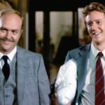 “There’s No Smoking In Heaven, John”: ‘Beverly Hills Cop’ Star Judge Reinhold Pays Tribute To His “Sarge” & “Brother” John Ashton