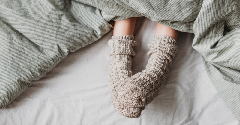 Is Wearing Socks to Bed OK? 2 Sleep Experts Weigh In