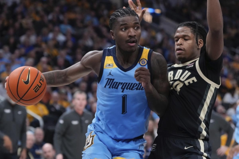 Kam Jones gets unusual triple-double to lead No. 15 Marquette to dominant upset win over No. 6 Purdue