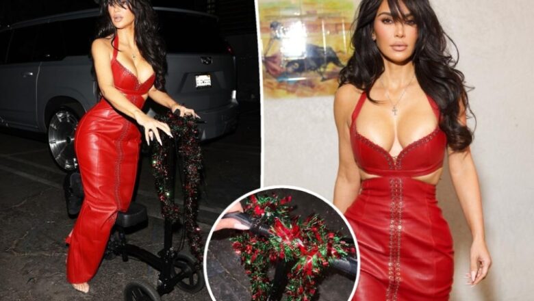 Kim Kardashian gets joyful in lace-up leather gown and tinsel-wrapped scooter after breaking her foot