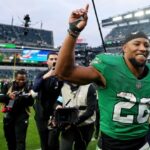 Saquon Barkley confesses he didn’t understand “hat and tee shirt” video games were a thing up until winning his very first NFC East title