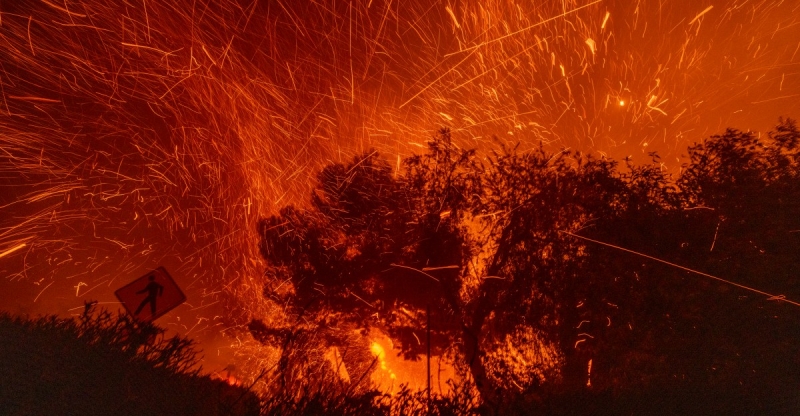 Live updates: Wildfires spread out throughout Los Angeles